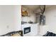 Functional laundry area with modern appliances, offering convenience and efficiency for household chores at 19635 Bellehurst Loop, Land O Lakes, FL 34638