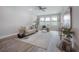 Inviting living room with a comfortable sofa, stylish decor, and plenty of natural light at 212 Villa Luna Ln, Lutz, FL 33549