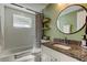 Bathroom showcasing granite counters, modern fixtures, and stylish decor at 2750 Edenwood St, Clearwater, FL 33759