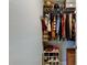 Walk-in closet with wire shelving, organizing a mix of clothing, hats, and shoes at 2750 Edenwood St, Clearwater, FL 33759
