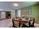 Open dining area featuring a modern table set for six at 2750 Edenwood St, Clearwater, FL 33759
