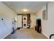 Spacious garage featuring a washer and dryer, storage shelves, and ample room for tools and equipment at 2750 Edenwood St, Clearwater, FL 33759