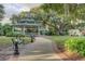 Picturesque gazebo nestled in a park-like setting with manicured lawns, mature trees, and inviting benches at 2750 Edenwood St, Clearwater, FL 33759