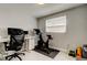 Home office with a work station and exercise bike at 2750 Edenwood St, Clearwater, FL 33759