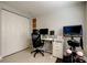 Home office with closet, work station, and exercise bike at 2750 Edenwood St, Clearwater, FL 33759