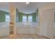 Elegant bathroom with Jacuzzi soaking tub at 31 Freshwater Dr, Palm Harbor, FL 34684