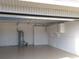 Spacious two car garage with work area and storage at 31 Freshwater Dr, Palm Harbor, FL 34684