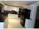 Spacious kitchen featuring modern appliances and custom cabinetry at 31 Freshwater Dr, Palm Harbor, FL 34684