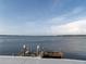 Scenic waterfront view with private dock and boat lift at 31 Freshwater Dr, Palm Harbor, FL 34684