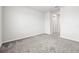 Spacious bedroom with neutral carpeting and modern outlets, offering a comfortable and customizable living space at 31355 Amberview Bnd, Wesley Chapel, FL 33545