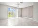 Bright and airy living space with natural light and sliding glass doors to the backyard at 31355 Amberview Bnd, Wesley Chapel, FL 33545
