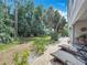 Lounge chairs sit on a brick patio in the backyard at 3138 Nautical S Pl, St Petersburg, FL 33712