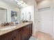 Beautiful bathroom with double sinks and granite countertops and access to the main bedroom at 3138 Nautical S Pl, St Petersburg, FL 33712