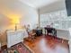 Bedroom area features a rocking chair, vanity, area rug, and lamp at 3138 Nautical S Pl, St Petersburg, FL 33712