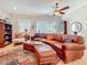 Comfortable living room with leather seating, stylish decor, and plenty of natural light at 3138 Nautical S Pl, St Petersburg, FL 33712