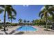 Gorgeous community pool area with clear blue water, perfect for relaxation and recreation at 3138 Nautical S Pl, St Petersburg, FL 33712