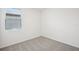 Cozy bedroom with neutral carpet and natural light from window at 31647 Malbec Dr, Brooksville, FL 34602