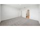 Spacious bedroom with neutral carpet, a walk-in closet, and ample natural light at 31647 Malbec Dr, Brooksville, FL 34602