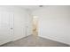 Bedroom with neutral carpet and white walls, ready for personalization at 31647 Malbec Dr, Brooksville, FL 34602