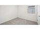 Bedroom with a neutral color scheme and plenty of natural light at 31647 Malbec Dr, Brooksville, FL 34602