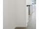 Bright hallway featuring neutral walls and ceramic tile flooring at 31647 Malbec Dr, Brooksville, FL 34602