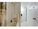Bright bathroom with shower-tub combination and hand rails for easy access at 3534 Lake Bayshore Dr # 118, Bradenton, FL 34205