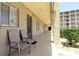 Charming condo exterior with a balcony, comfortable seating, and a view of the complex at 3534 Lake Bayshore Dr # 118, Bradenton, FL 34205