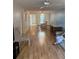Inviting living room featuring hardwood floors, an open layout, and lots of natural light at 3534 Lake Bayshore Dr # 118, Bradenton, FL 34205