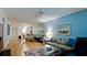 Cozy living room and dining area with hardwood floors, neutral walls, comfortable seating, and modern decor at 3534 Lake Bayshore Dr # 118, Bradenton, FL 34205