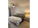 Comfortable main bedroom with a ceiling fan, closet and relaxing decor at 3534 Lake Bayshore Dr # 118, Bradenton, FL 34205
