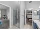 Ensuite bathroom featuring a glass enclosed shower and access to the walk-in closet at 3703 Treeline Dr, Valrico, FL 33596