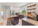 Well-equipped kitchen with granite countertops, stainless steel appliances, and an island with seating at 37309 Fountain Rd, Zephyrhills, FL 33542