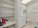 Bathroom with ample storage, including shelves and cabinets for organization at 3789 46Th S Ave # 204, St Petersburg, FL 33711