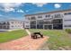 Spacious building exterior with manicured lawn, picnic table, and serene atmosphere for outdoor enjoyment at 3789 46Th S Ave # 204, St Petersburg, FL 33711