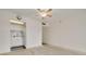 Bright living room featuring a ceiling fan and access to the kitchen area at 3789 46Th S Ave # 204, St Petersburg, FL 33711