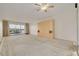 Spacious living room with balcony and built-in cabinets, offering ample storage and relaxation space at 3789 46Th S Ave # 204, St Petersburg, FL 33711