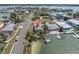 Coastal home featuring a private dock, waterfront access, and easy street entry at 399 161St Ave, Redington Beach, FL 33708