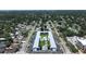 A top-down view of the condo and its surroundings showcasing residential neighborhood with beautiful landscaping at 4050 4Th N St # 205, St Petersburg, FL 33703