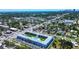 Panoramic view of the condo complex situated within a vibrant city, lush landscapes and ocean in the background at 4050 4Th N St # 205, St Petersburg, FL 33703