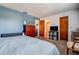 Inviting bedroom with blue accent wall, and en-suite bathroom access at 4050 4Th N St # 205, St Petersburg, FL 33703