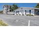 Inviting condo building featuring classic design and well-maintained landscaping in a desirable neighborhood at 4050 4Th N St # 205, St Petersburg, FL 33703