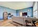 Cozy living room featuring modern decor, a desk, and natural light at 4050 4Th N St # 205, St Petersburg, FL 33703