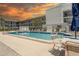 Outdoor pool area with lounge chairs and landscaped surroundings at 4050 4Th N St # 205, St Petersburg, FL 33703