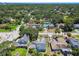 Aerial neighborhood view showcasing tree-lined streets and lush greenery at 4203 W Cleveland St, Tampa, FL 33609