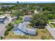 Aerial view of home with mature trees and lush landscape in a suburban neighborhood at 4203 W Cleveland St, Tampa, FL 33609