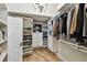 Spacious walk-in closet with custom shelving and wood floors at 4203 W Cleveland St, Tampa, FL 33609