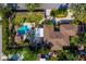 Overhead aerial view of the property layout highlighting the pool, patio, and landscaping at 4301 S Lockwood Ridge Rd, Sarasota, FL 34231