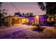 Enclosed patio with decorative lights for outdoor gatherings at 4301 S Lockwood Ridge Rd, Sarasota, FL 34231