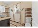 Bright bathroom with stylish sink, decorative mermaid, and modern fixtures at 4301 S Lockwood Ridge Rd, Sarasota, FL 34231