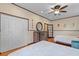 Spacious bedroom with hardwood floors, twin beds, and a coastal-themed decor at 4301 S Lockwood Ridge Rd, Sarasota, FL 34231